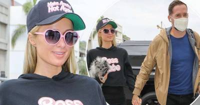 Paris Hilton and boyfriend Carter Reum hit the airport - www.msn.com