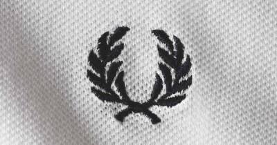 Fred Perry's iconic symbol and the controversial battle being fought over it - www.manchestereveningnews.co.uk
