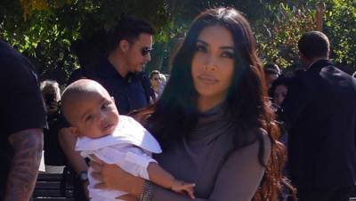 Kim Kardashian Gushes Over Adorable Baby Psalm, 1, As He Poses On A Kayak: ‘This Face’ - hollywoodlife.com