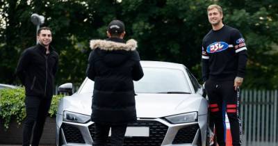 Dan Osborne beams as he picks up brand new £167,000 Audi supercar - www.ok.co.uk