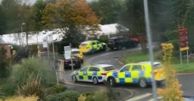 Armed police swoop on Bury high school after reports 'someone had a gun' - it turned out to be a hoax - www.manchestereveningnews.co.uk