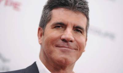 Simon Cowell looks unrecognisable in epic throwback photo from the bath - hellomagazine.com