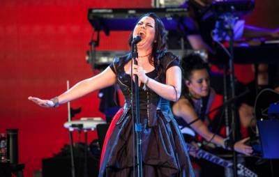 Evanescence’s Amy Lee says record label wanted male singer to make band “familiar” - www.nme.com