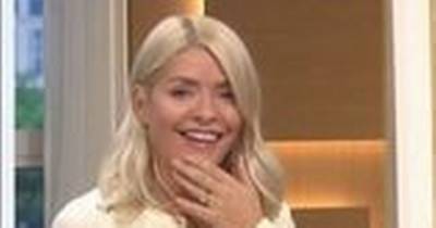 Holly Willoughby shares throwback snap from son's first birthday as she slams Arsenal for sacking mascot - www.ok.co.uk