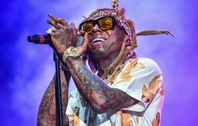 Listen to Lil Wayne’s American football-inspired new song ‘NFL’ - www.nme.com - USA - Chicago - county Bay