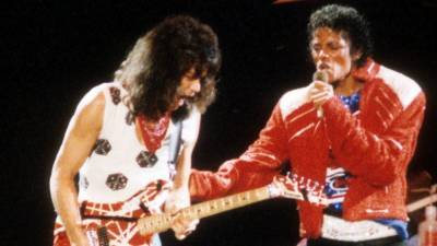 How Eddie Van Halen's Uncredited Guitar Solo on Michael Jackson's 'Beat It' Came to Be - www.etonline.com