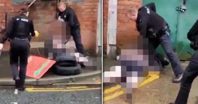 Dramatic footage captures the moment boy, 15, is Tasered - after officers 'assaulted and piece of police equipment snatched' - www.manchestereveningnews.co.uk