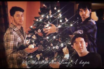 The Jonas Brothers Share Their Family Photos And Home Videos In ‘I Need You Christmas’ Video - etcanada.com