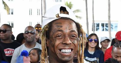 Lil Wayne charged with federal weapons crime - www.wonderwall.com - California