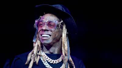 Lil Wayne charged with possession of firearm and ammunition by a convicted felon stemming from 2019 incident - www.foxnews.com - Florida
