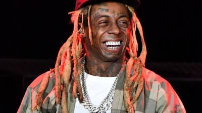 Lil Wayne Charged With Possessing Gun as a Convicted Felon - www.etonline.com - Florida