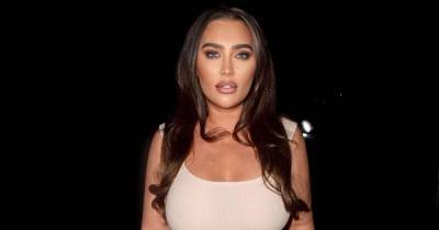 Lauren Goodger stuns as she shows off figure in crop top and tracksuit bottoms after photoshoot - www.ok.co.uk - London