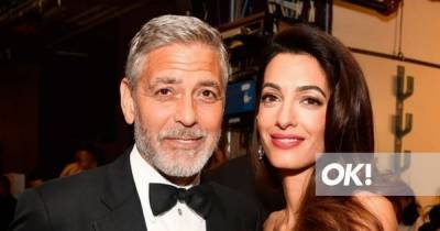 George and Amal Clooney claimed 'they didn't know Prince Harry and Meghan' while at their wedding - www.ok.co.uk