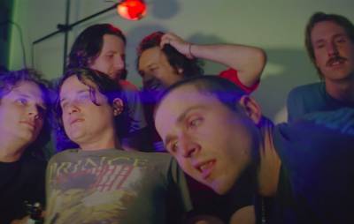 King Gizzard and the Lizard Wizard throw a surreal house party in ‘Intrasport’ video - www.nme.com