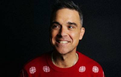 Robbie Williams tackles coronavirus on new festive single ‘Can’t Stop Christmas’ - www.nme.com - Santa
