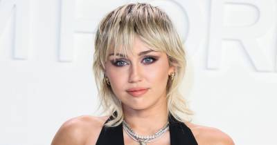 Miley Cyrus Tells All Her Exes to ‘Eat S–t’ in ‘Prisoner’ Music Video With Dua Lipa - www.usmagazine.com