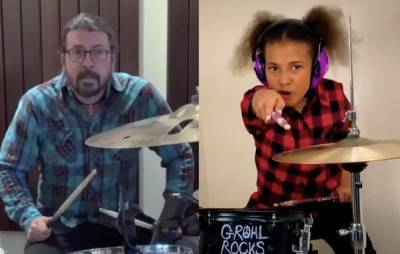 Dave Grohl concedes defeat in drum battle with Nandi Bushell: “This kid is a force of nature” - www.nme.com