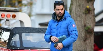 Dominic Cooper Looks After His Beloved Classic Car in London - www.justjared.com - Britain - Poland
