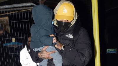 Chris Brown Cradles His Sleeping Son Aeko, 1, In His Arms: See Precious Pic - hollywoodlife.com