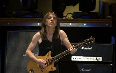 AC/DC’s Cliff Williams hopes Malcolm Young is “looking down and liking” new album - www.nme.com - Australia