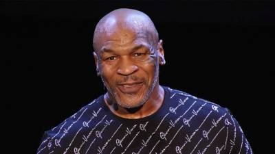 Mike Tyson Rips Off His Shirt to Show He's Lost 100 Pounds During Live Morning Show Interview - www.etonline.com