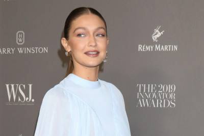 Gigi Hadid shares new pictures with her ‘bestie’ daughter as they put Christmas decorations up - www.hollywood.com