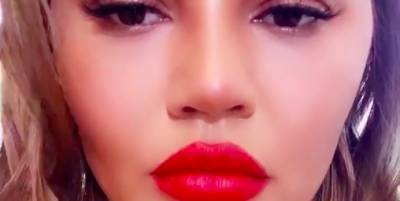 Chrissy Teigen's Red Lip Is the Holiday Season Beauty Inspo You Need - www.marieclaire.com