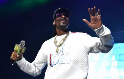 Snoop Dogg shares Christmas version of his Just Eat song ‘Did Somebody Say’ - www.nme.com - Britain
