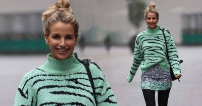 Vogue Williams wows in a patterned sweater with matching miniskirt - www.msn.com