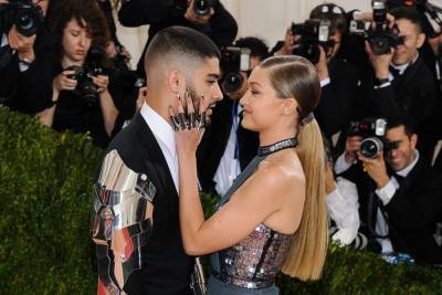 Gigi Hadid and Zayn Malik share first family snap of new daughter on Halloween - www.hollywood.com