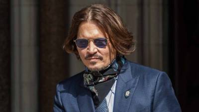 Johnny Depp Loses Libel Case Over British Tabloid That Accused Him of Abusing Amber Heard - www.etonline.com - Britain