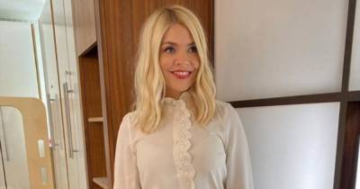 Holly Willoughby stuns fans in ruffle blouse on This Morning - copy her look from £15.99 - www.ok.co.uk