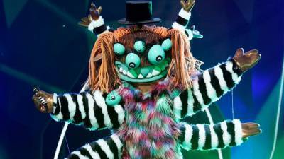 'The Masked Singer': Squiggly Monster Gets Straightened Out in Hilarious Elimination -- See Who Got Unmasked! - www.etonline.com
