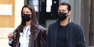 Katie Holmes Paired a Ruffled Blouse with an Edgy Leather Trench for a Walk with Her New Beau - www.harpersbazaar.com - New York
