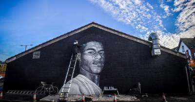 A powerful mural honouring Marcus Rashford MBE has appeared in a Manchester suburb where he lived as a boy - www.manchestereveningnews.co.uk - Manchester