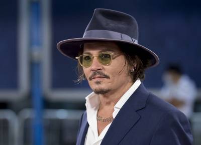 Johnny Depp forced from Fantastic Beasts but vows to clear his name - evoke.ie