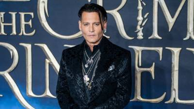 Johnny Depp Forced to Resign 'Fantastic Beasts' Films After Losing Court Battle - www.etonline.com