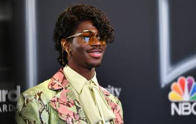Lil Nas X announces new single ‘Holiday’ in time-travelling Christmas teaser - www.nme.com - USA - Santa