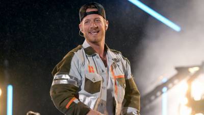 Florida Georgia Line's Tyler Hubbard Is Quarantining on Tour Bus Outside His Home After Contracting COVID-19 - www.etonline.com - Florida - county Hubbard