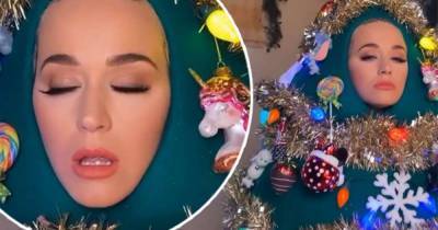Katy Perry offers a sneak peek of her Christmas tree costume - www.msn.com