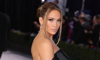 Jennifer Lopez looks unreal in plunging bodysuit and knee-high boots - hellomagazine.com