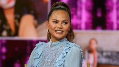 Chrissy Teigen Claps Back at 'Weird and Angry' Commenter Who Said She Was Unfollowing Her - www.etonline.com
