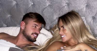 Katie Price strips topless as she cuddles boyfriend Carl Woods and gushes over their 'connection' - www.ok.co.uk