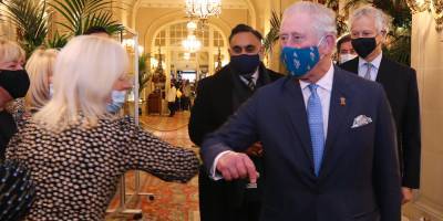 Prince Charles Surprises Party Attendees With Royal Elbow Bumps! - www.justjared.com - Britain