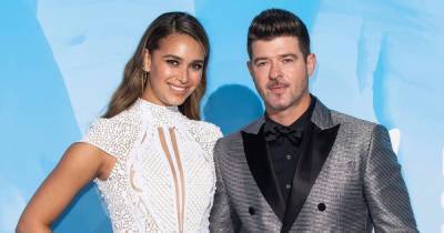 April Love Geary Gives Birth to 3rd Child With Fiance Robin Thicke, His 4th - www.usmagazine.com