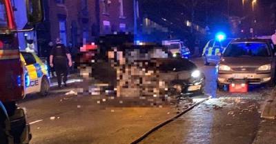 Horror crash in Oldham as black BMW crashes into building - www.manchestereveningnews.co.uk - county Oldham