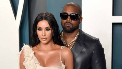 Kim Kardashian and Kanye West leading 'separate lives' in marriage: report - www.foxnews.com