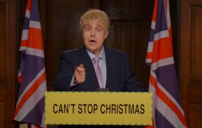 Watch Robbie Williams play Boris Johnson in video for festive single ‘Can’t Stop Christmas’ - www.nme.com - Britain - county Johnson