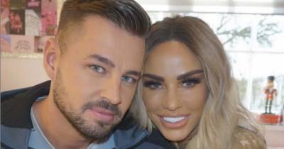 Katie Price takes a shot at her exes by admitting that 'she's never had a man that pays' before Carl Woods - www.ok.co.uk