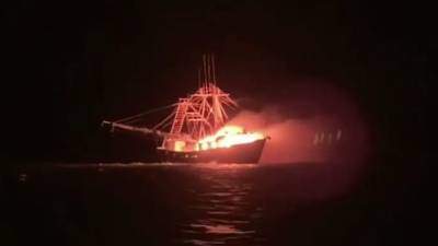 Coast Guard rescues 4 people off Alabama after vessel bursts into flames - www.foxnews.com - Alabama